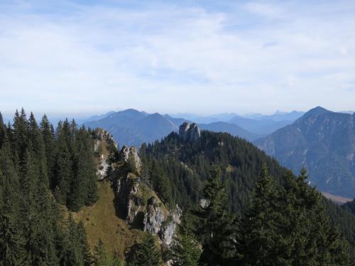 a view of a mountain with trees and mountains at Apparthotel - Pension Ammertaler Hof in Saulgrub