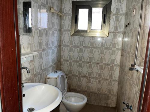 Koupelna v ubytování Résidence DEMBELE