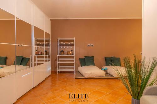 a room with two beds with pillows on them at Lussuosa Villa con piscina a Porto Rotondo in Cugnana
