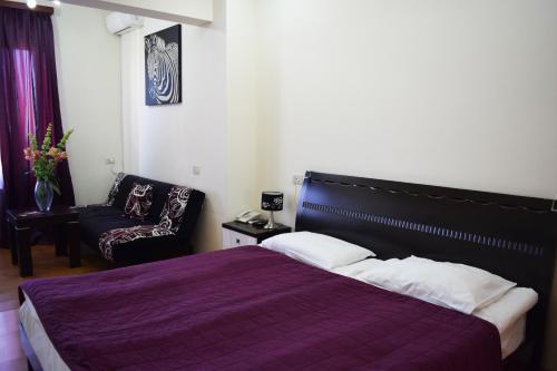 Cama o camas de una habitación en Hotel Grig