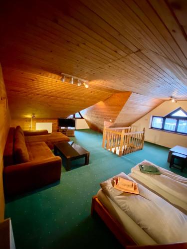 En eller flere senge i et værelse på Reitmayer