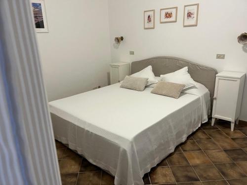 Ένα ή περισσότερα κρεβάτια σε δωμάτιο στο En-suite Double Room-Giardino A Mare