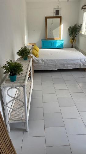 Llit o llits en una habitació de Bleue turquoise