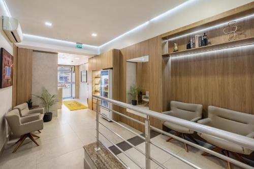 Zona de estar de Hotel Erechim