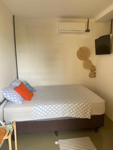 Ένα ή περισσότερα κρεβάτια σε δωμάτιο στο Flats Parada Obrigatoria