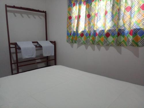 Postel nebo postele na pokoji v ubytování Serene Nest