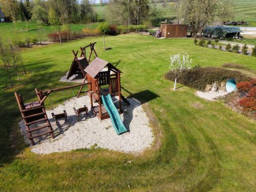 an aerial view of a playground with a slide at Penzion Terezka in Králíky