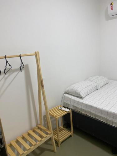 Ένα ή περισσότερα κρεβάτια σε δωμάτιο στο Flats Parada Obrigatoria