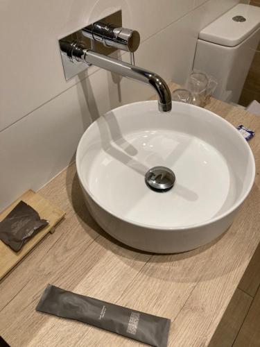 a white sink with a faucet on a counter at Los Guardeses in Solares
