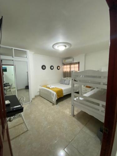 Postel nebo postele na pokoji v ubytování CASA PACHITA Getsemani