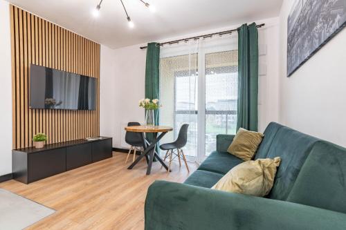 Televízia a/alebo spoločenská miestnosť v ubytovaní WrocApartments WestCenter - Legnicka Residence