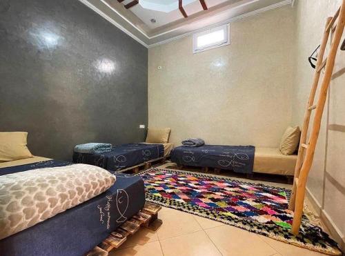 Una cama o camas en una habitación de Fleur de cactus
