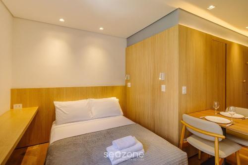 Postel nebo postele na pokoji v ubytování Lindas Unidades no Bairro Auxiliadora em PoA - CEN