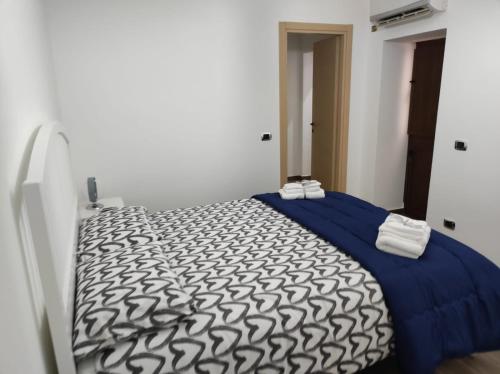 Cama o camas de una habitación en Le Case di Mariù