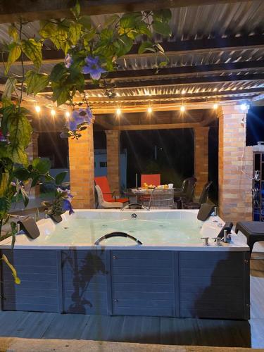 a jacuzzi tub in a room with at Villa Nikitina in Los Santos
