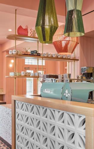 a counter in a restaurant with three lights at La Concha Key West, Autograph Collection in Key West