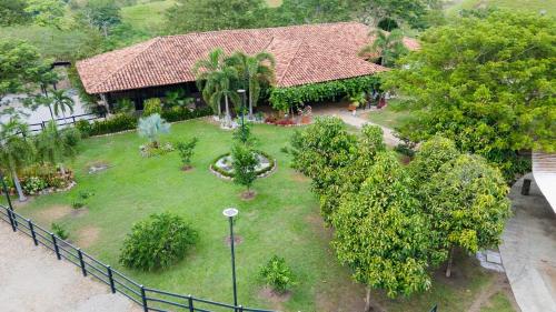 an aerial view of a house with a garden at Hacienda San Nicolas -Pto Boyaca in Puerto Triunfo