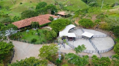 an overhead view of a park with a building at Hacienda San Nicolas -Pto Boyaca in Puerto Triunfo