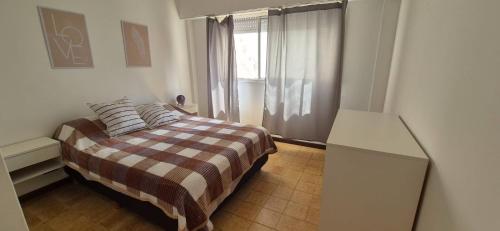 Postel nebo postele na pokoji v ubytování Departamento MAR DEL PLATA