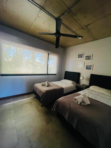 Postel nebo postele na pokoji v ubytování Los plátanos 1 y 2