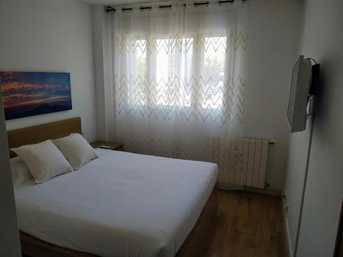 Postel nebo postele na pokoji v ubytování Vivienda de 1 habitación independiente, metro La Moraleja