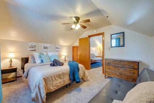 a bedroom with a bed and a ceiling fan at The Babbling Brooke in Blakeslee