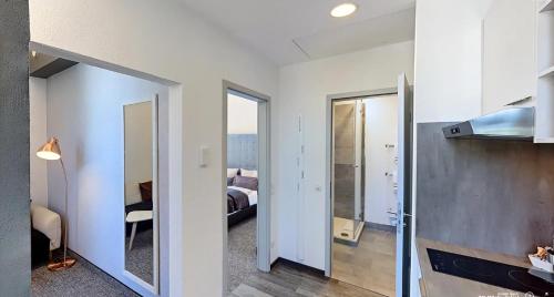 Postel nebo postele na pokoji v ubytování Boardinghouse Emden