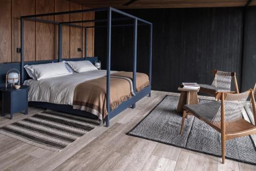 Una cama o camas en una habitación de Tierra Atacama