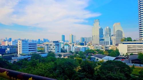 a view of a city with tall buildings at River View Active 02 in Bangkok