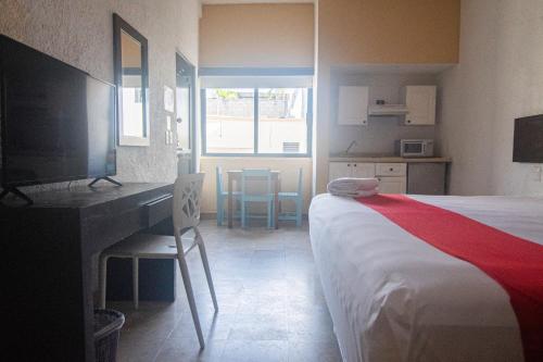 Postel nebo postele na pokoji v ubytování Hotel Maya Turquesa