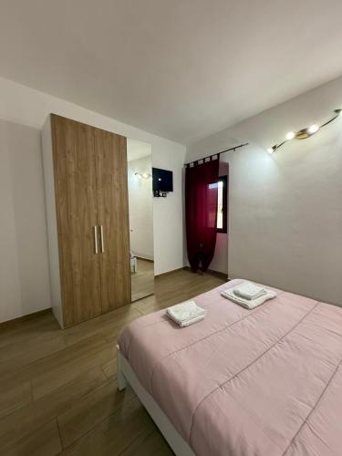 Postel nebo postele na pokoji v ubytování Sara's apartments