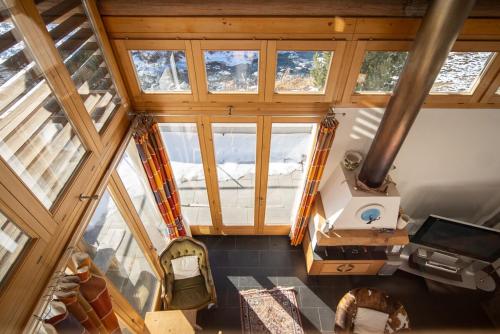 an overhead view of a house with windows at Chalet a Saint Moritz with Sauna Privata in Pontresina
