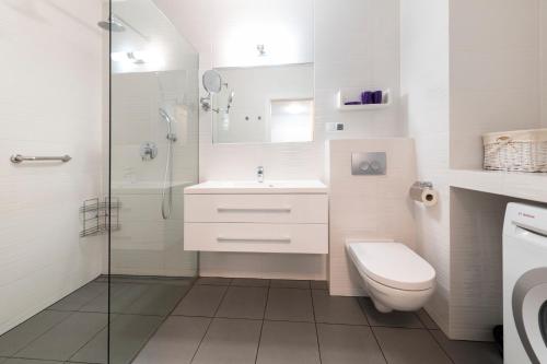 Kúpeľňa v ubytovaní Apartamenty Bursztynowe