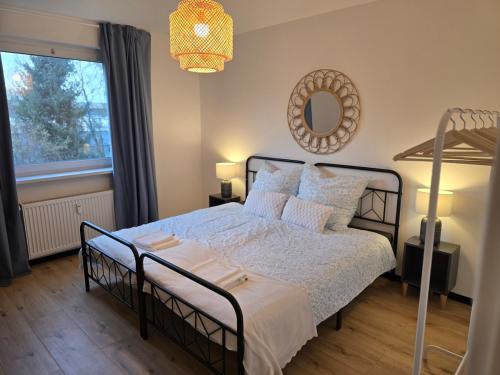 Katil atau katil-katil dalam bilik di Zentrumsnah in Kassel - Balkon - Gratis Parken