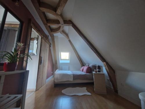 Postel nebo postele na pokoji v ubytování Appartement duplex beaucens