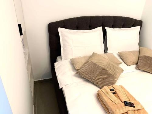 Ein Bett oder Betten in einem Zimmer der Unterkunft Oltenia Studio Decebal Residence Craiova