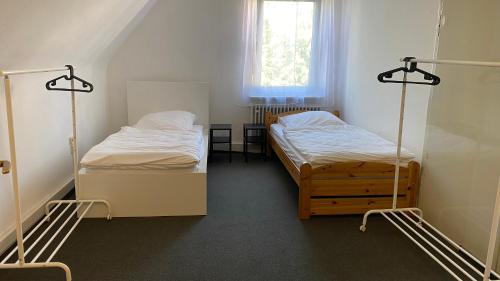 Postel nebo postele na pokoji v ubytování Bolt & Break WHG 3