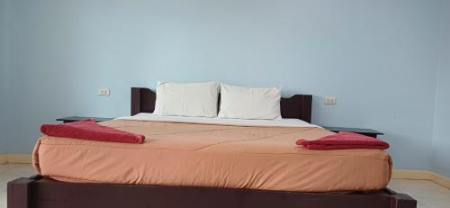 Ένα ή περισσότερα κρεβάτια σε δωμάτιο στο Salamat Hillside S08