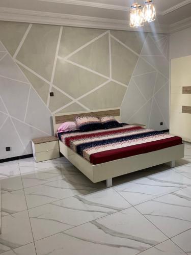 Voodi või voodid majutusasutuse Comfortable apartment! toas
