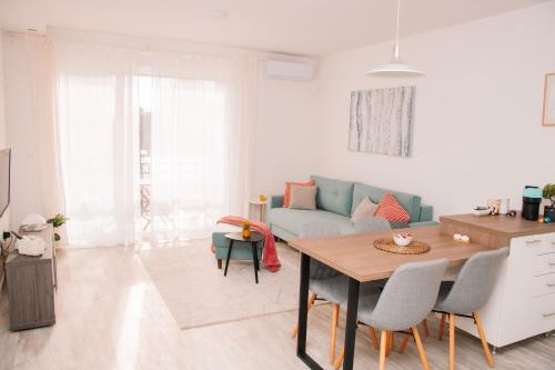 Posezení v ubytování Blue Apartment