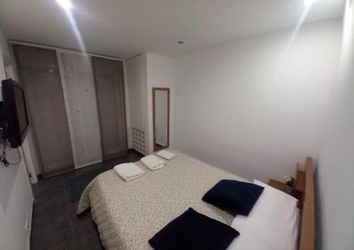 Katil atau katil-katil dalam bilik di Sol y playa duplex