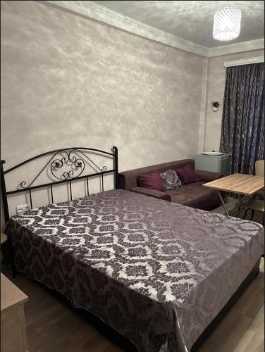 Postel nebo postele na pokoji v ubytování Hotel Meskheti Bakuriani