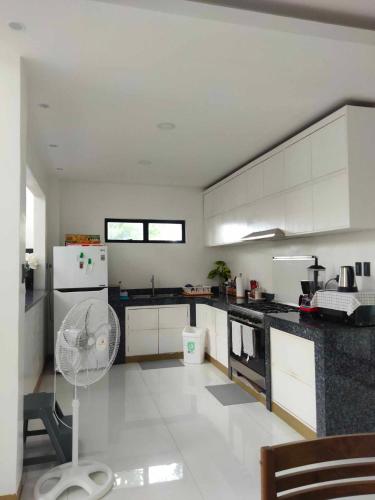 Kuchyň nebo kuchyňský kout v ubytování RLJ Beach House
