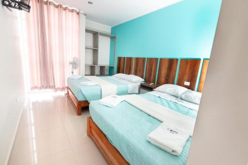 Ένα ή περισσότερα κρεβάτια σε δωμάτιο στο Hotel Costa Sur
