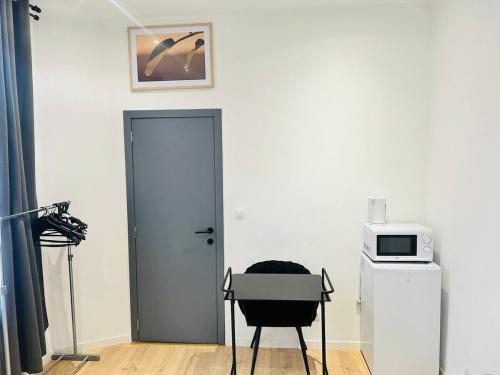 Kuchyň nebo kuchyňský kout v ubytování Apparts de standing Bruxelles Brady Muandaz