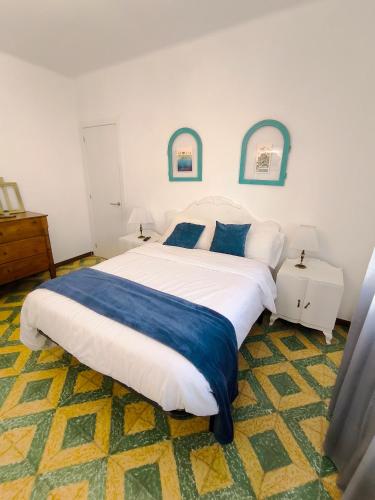 Katil atau katil-katil dalam bilik di Casa Arbós Casa rural a Arbeca, les Garrigues