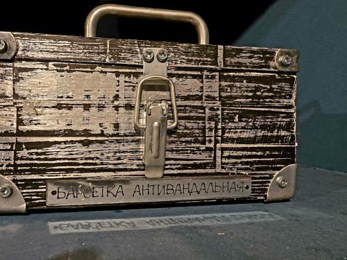 an old wooden trunk with a metal latch on it at Scary Hostel in Tbilisi City