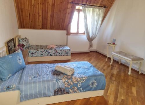 Llit o llits en una habitació de Дом