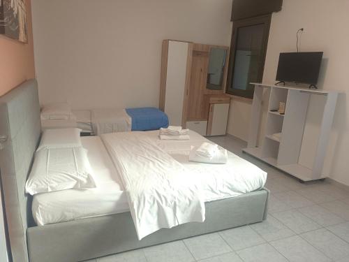 Postel nebo postele na pokoji v ubytování Venice Apartments