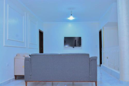 TV a/nebo společenská místnost v ubytování king valley House